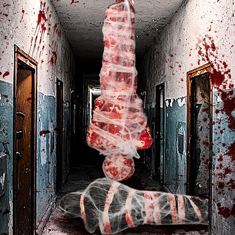 Bloody hanging corpse Halloween decoration in a horror hallway scene